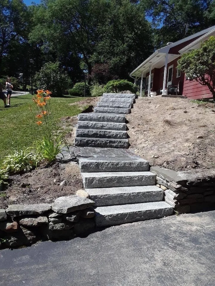 Granite steps set into a hillside in Central MA