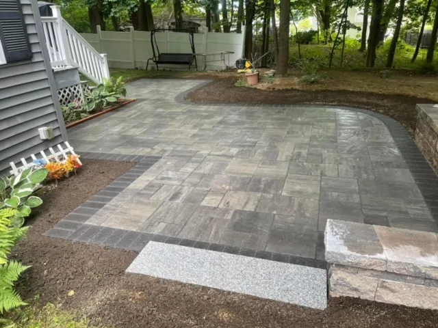 Paver patio with fresh mulch beds